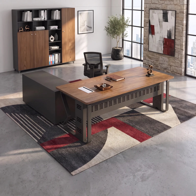 Patton manager desk with base return in a glass corner office