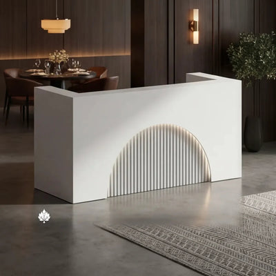 Beckett restaurant reception desk angled under brass sconces