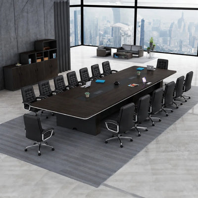 Overhead view of the Prime large conference table with black leather chairs by a city window