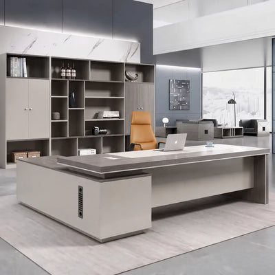 Purdue CEO desk in a blue-gray office with shelf wall
