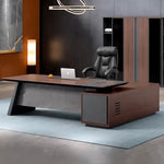 Slater desk in a charcoal office with amber chair and floor lamp