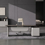 Tavren desk at sitting height in a gray gallery office