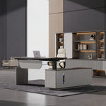 Tavren height adjustable desk lifted in a tan-panel office