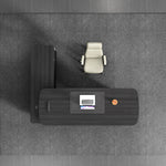 Tavren desk from above, dark top with control screen