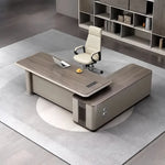 Teller desk, left return, laptop and snacks on top