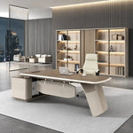 Tilson desk, right return, in a night office with shelf wall