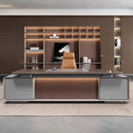 Twilley desk front-on, fluted band glowing over gray base