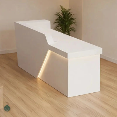 Paxton desk angled showing the notched counter and lit diagonal