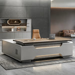Valence desk, right return, under-glow lighting on stone tile