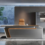 Varell desk front-on, wood liner glowing in the gray shell