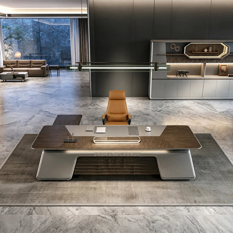 Velluto luxury desk in a marble executive suite with lit shelf wall