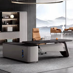 Veris desk with blade leg and drawer pod by the window