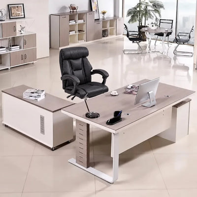 Vesper manager desk with base return in a bright showroom office